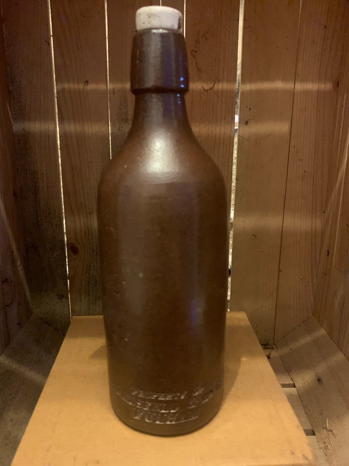 Vintage Dark Stoneware Beer Bottle with White Cap