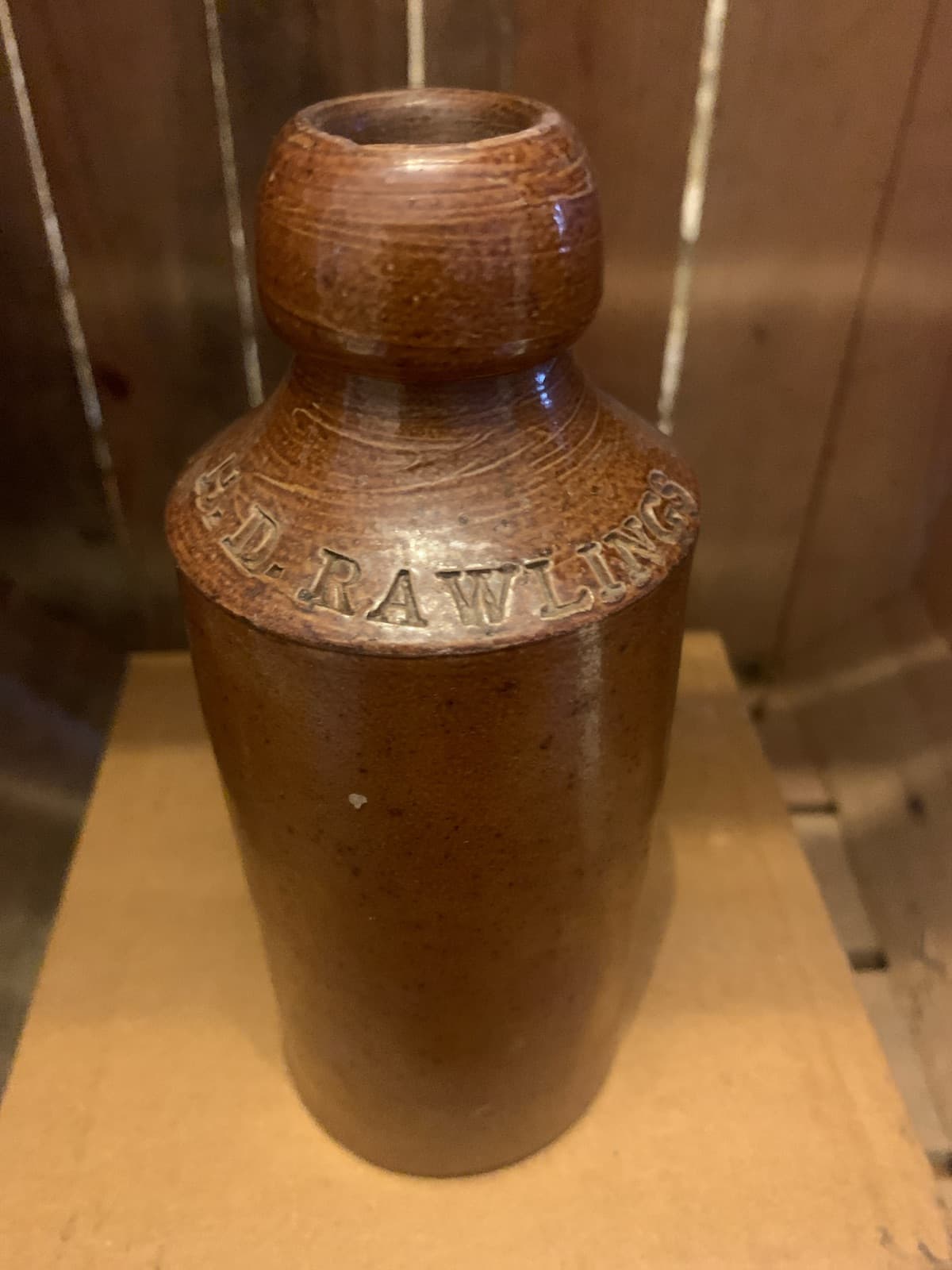 Vintage Stoneware Bottle with 'HD RAWLING' Embossed Text